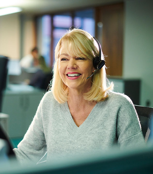 woman talking through a headset